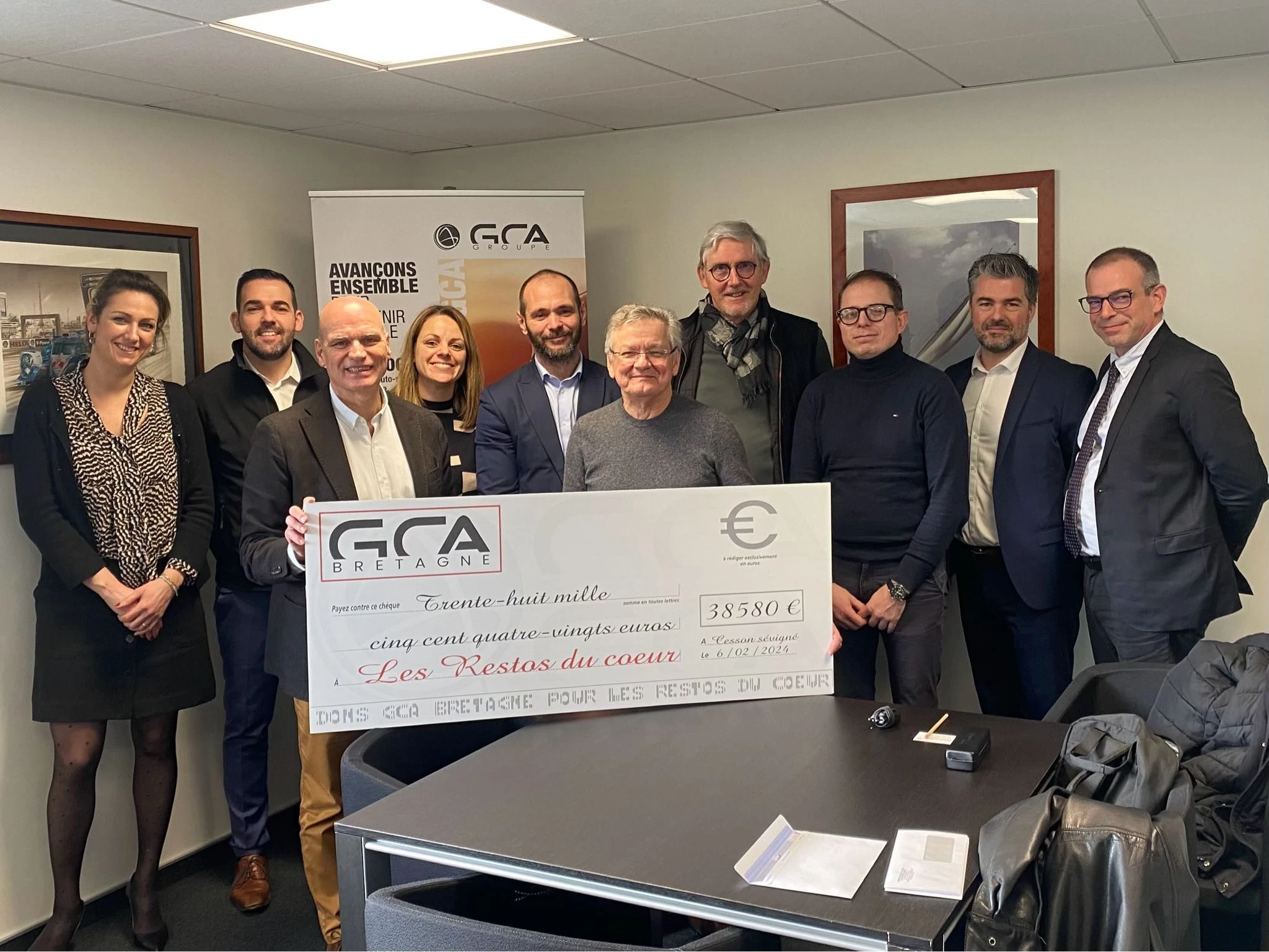 Remise de don aux restos du cœur